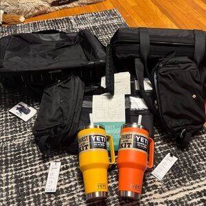 Insane getaway for 2- Yeti Yellow and Orange Rambler Mugs